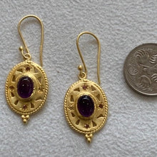 Load image into Gallery viewer, Gold with amethyst stone in the centre.
